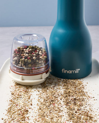 FinaMill spice pods stacked neatly to save counter space