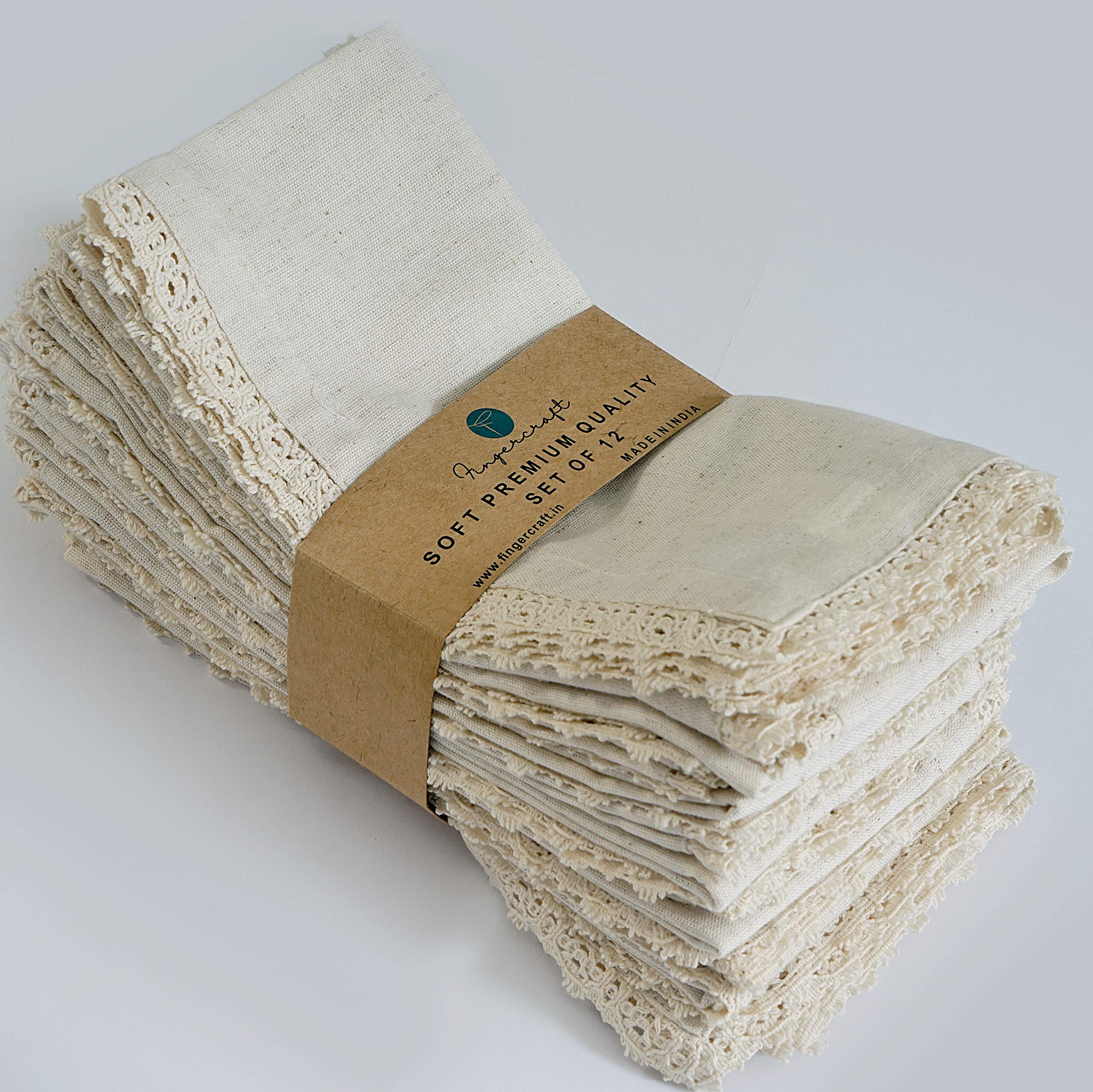 FingerCraft dinner napkins 12-pack in ivory on table for everyday dining elegance