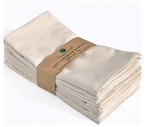 Fingercraft ivory dinner napkins, 12-pack, on table for elegant daily use.