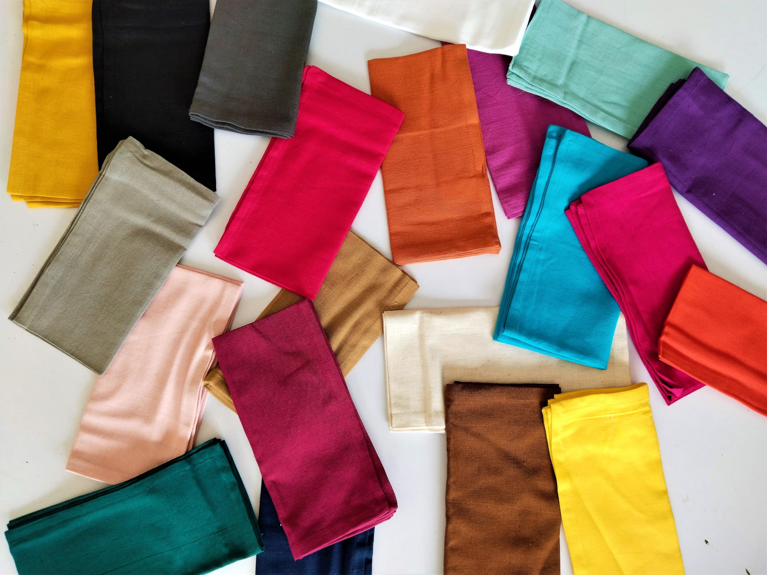 Fingercraft dinner napkins arranged for weddings or everyday meals.