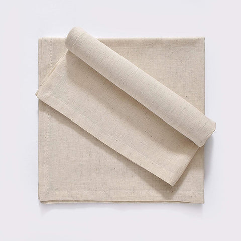 Fingercraft napkins featuring mitered corners add refined table detail.