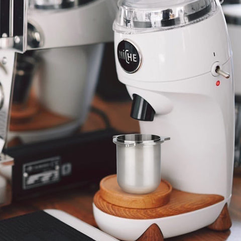 Dosing cup in a tidy workstation supporting faster workflow.