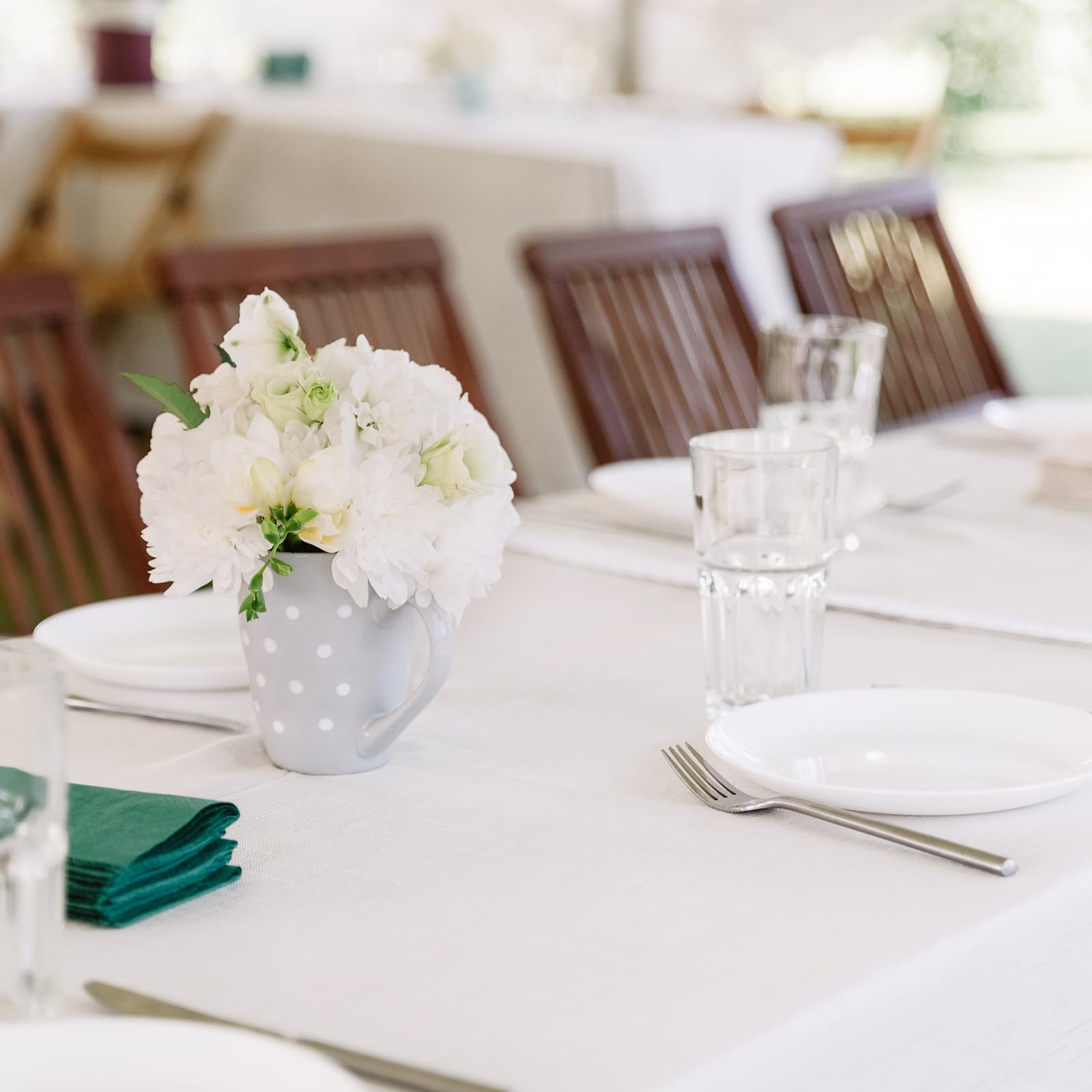 Fixwal fitted white tablecloth shields tables while looking polished