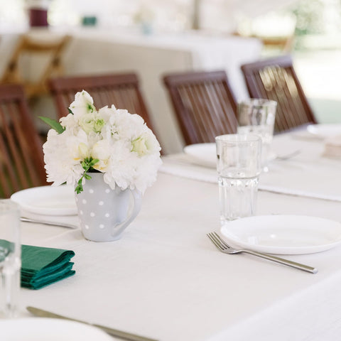 Fixwal fitted white tablecloth shields tables while looking polished