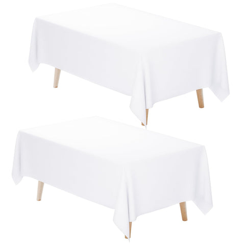 Fixwal white tablecloth on a 6 ft rectangular table with a 15-inch drop for elegant dining.