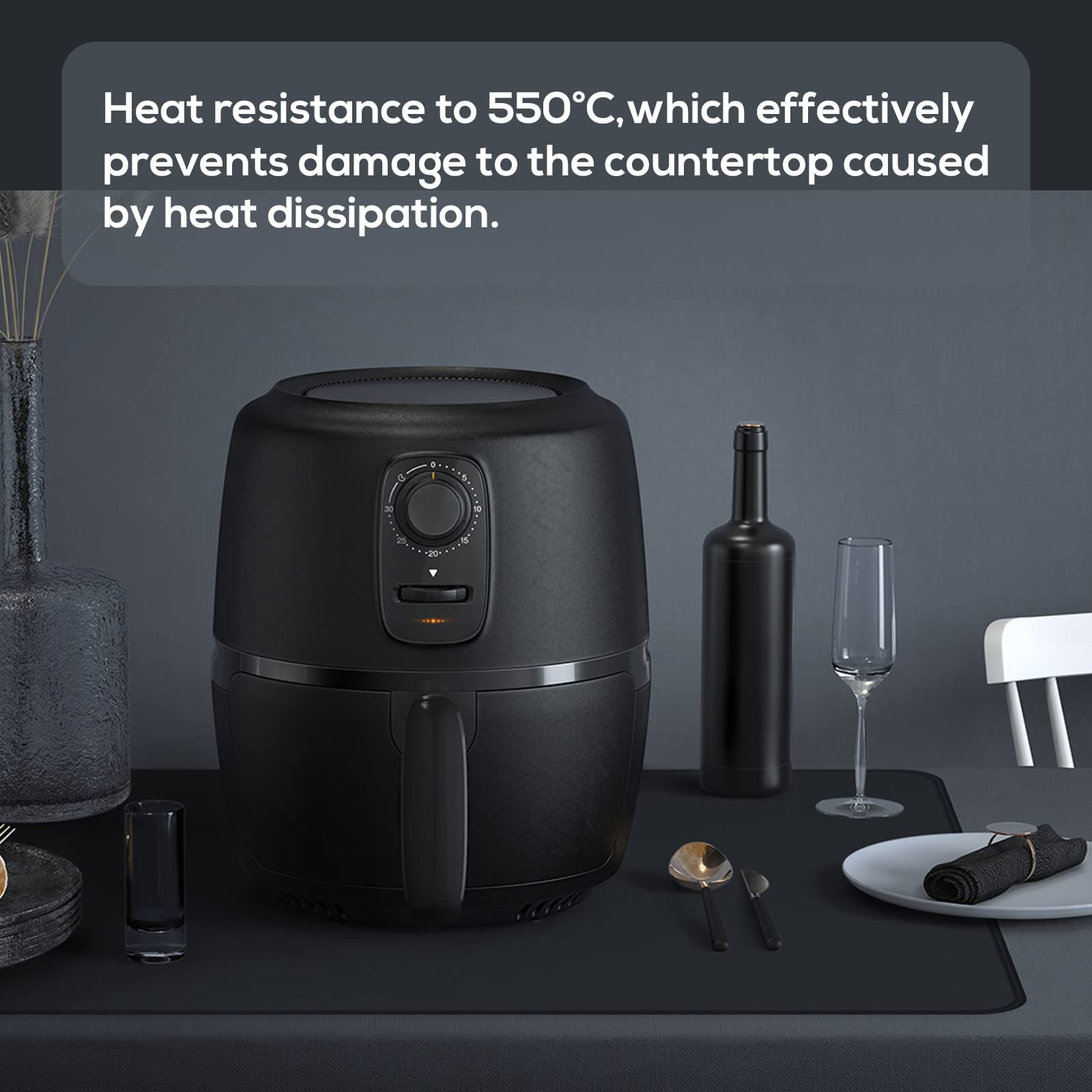 FLASLD waterproof silicone mat rolled beside a coffee maker.