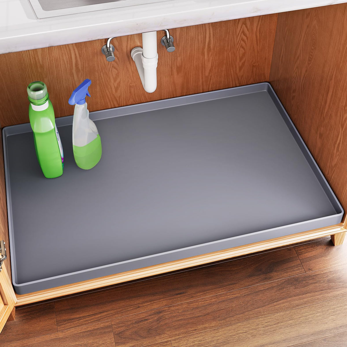 FLATO under-sink mat with cabinet-protector edge keeps cabinets dry and organized.