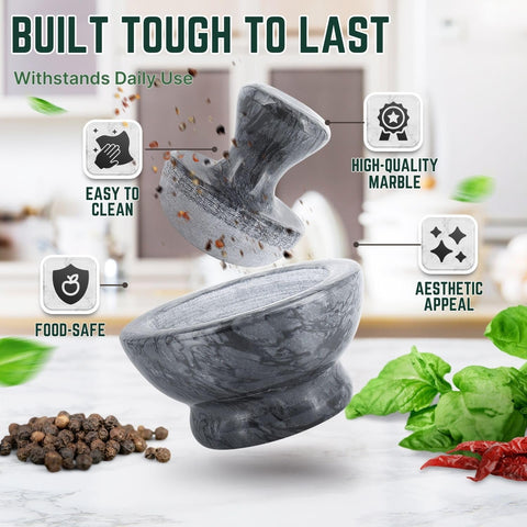 Black marble pestle and mortar adds elegant durability to kitchens.
