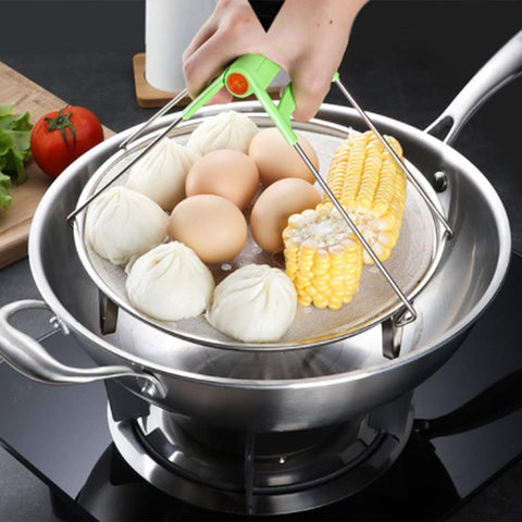 Fnoko steaming rack stacked beside pots to show compatibility.