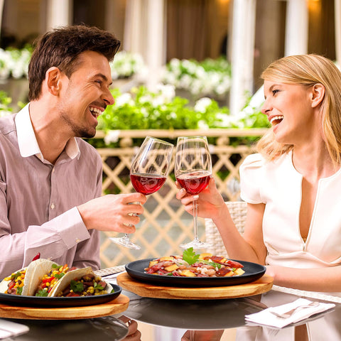 FoldTier wooden serving trays accompany sizzling plates for elegant presentation.