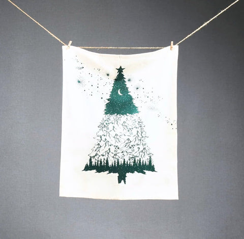 Folkulture tea towels displayed with dishware for festive table