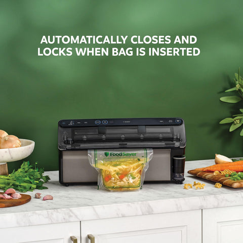 FoodSaver Elite Liquid+ retractable handheld sealer for quick marinating.