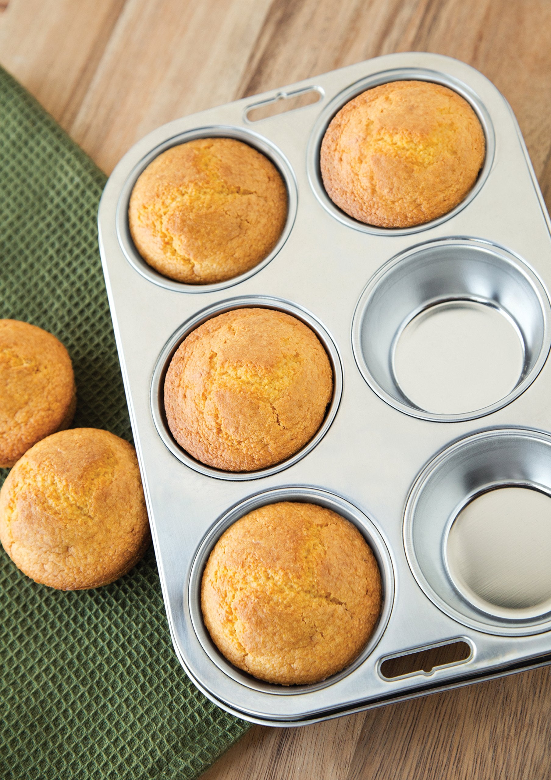 Fox Run 4867 muffin pan close-up in stainless steel finish.