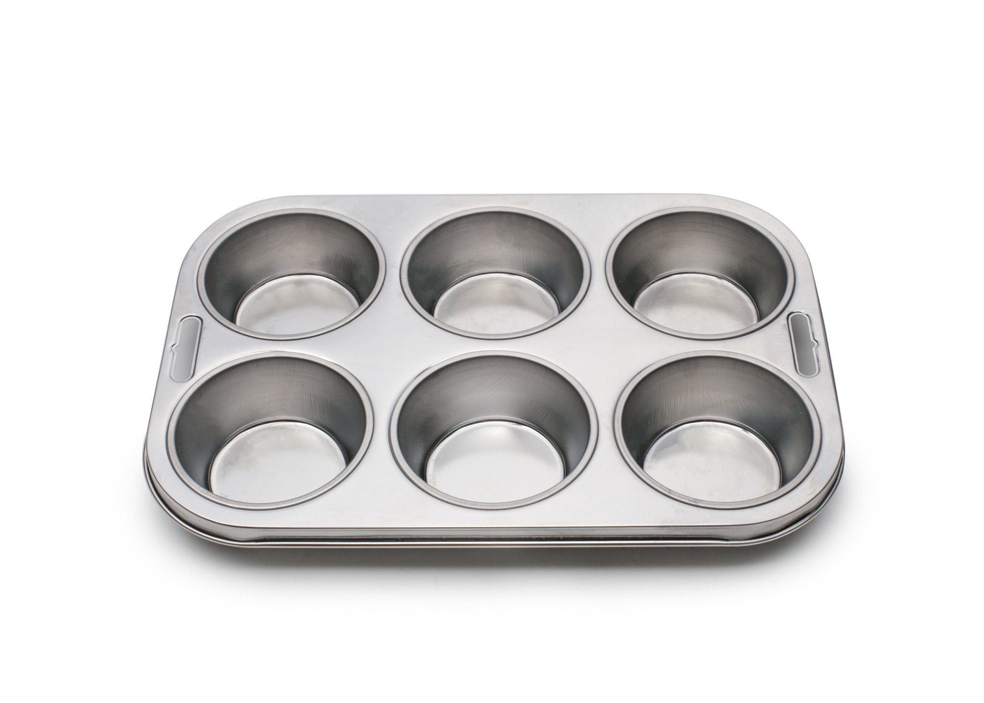 Fox Run 4867 muffin pan lined for baking showing even heat distribution.