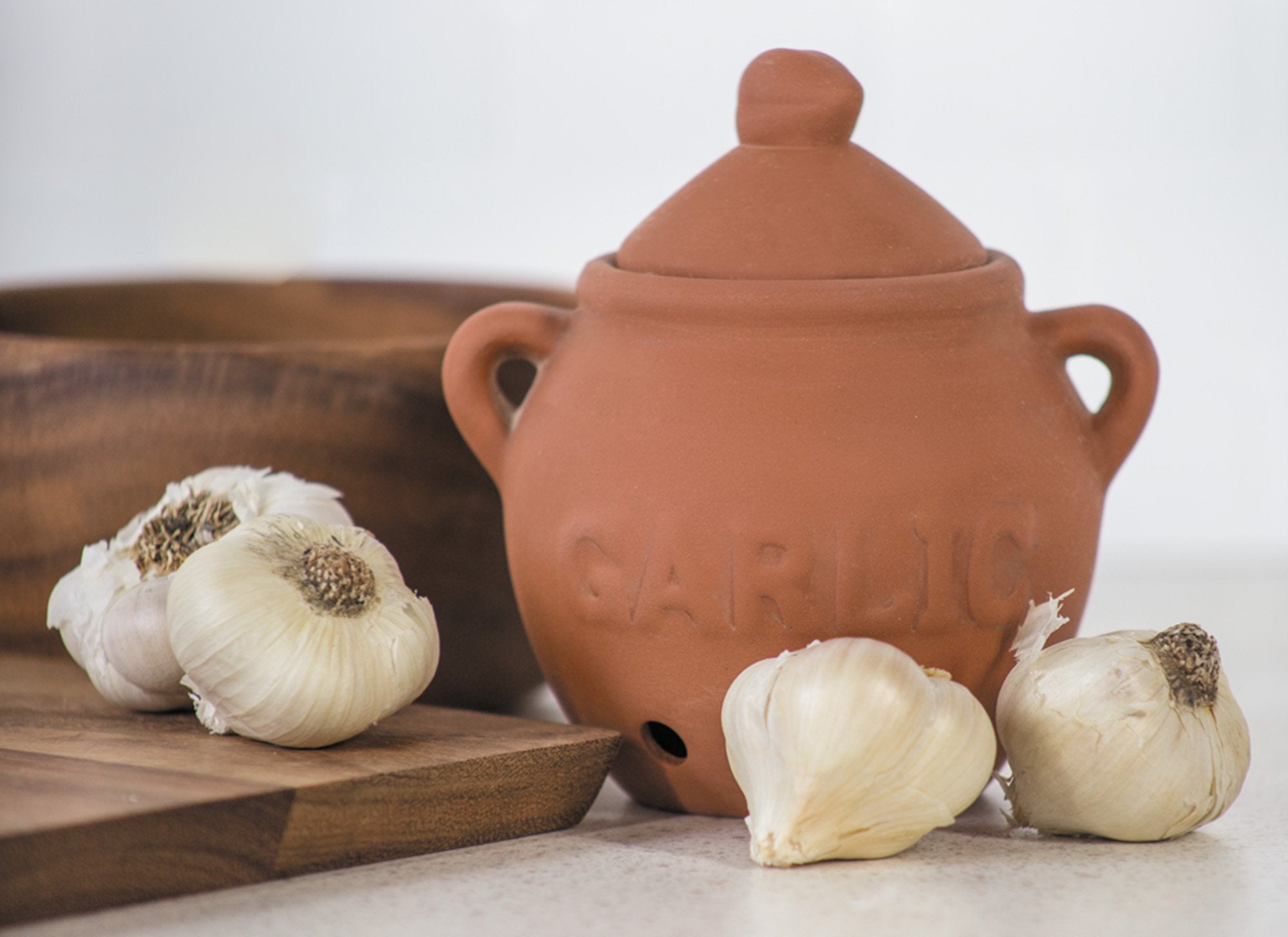 Fox Run garlic keeper porous terracotta design promotes airflow and dryness.