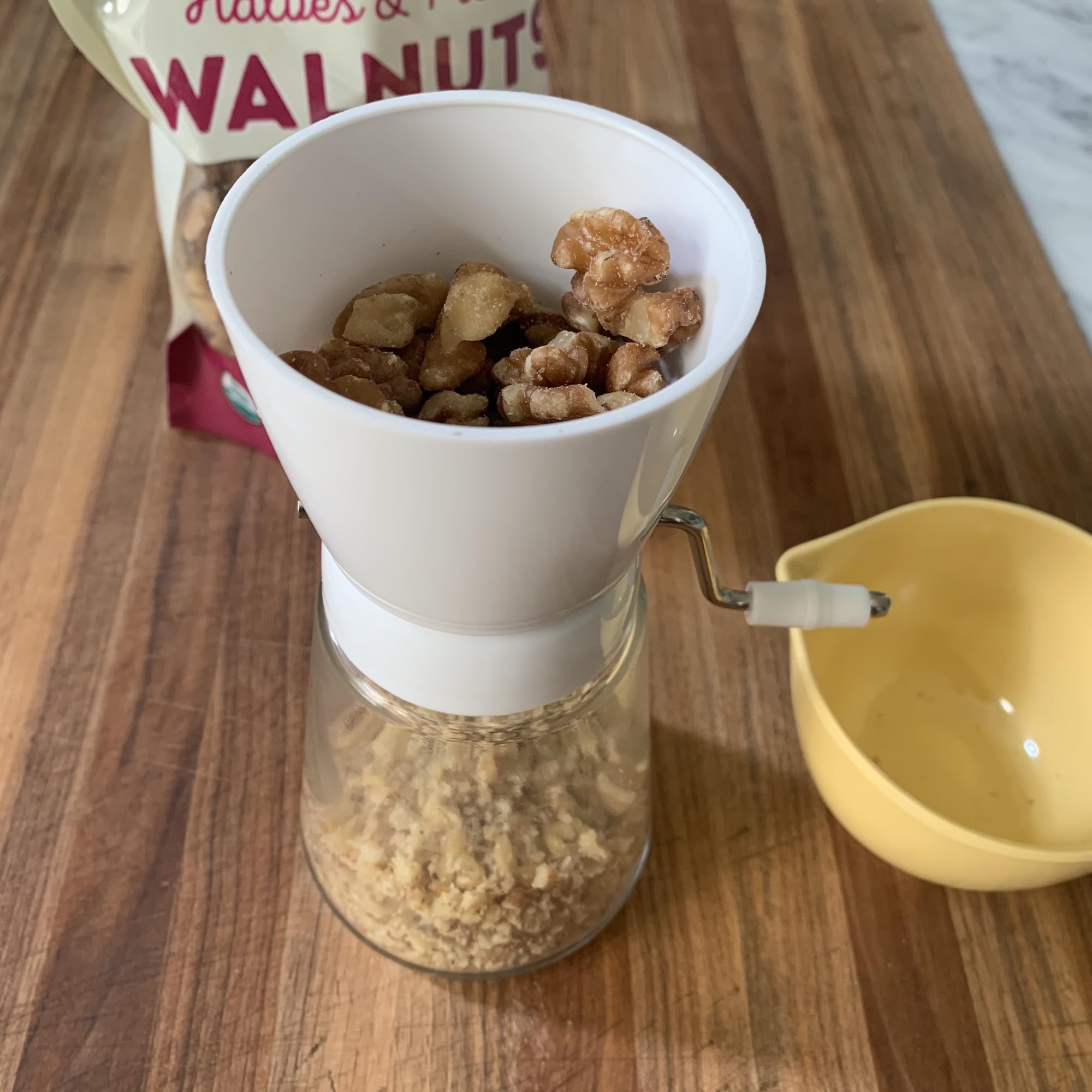 Fox Run 5716 nut chopper compact 7.5 inches fits on any counter.