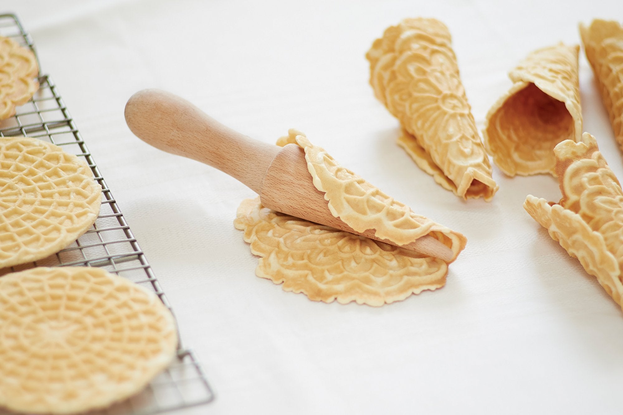 Fox Run wooden pastry tool for pizzelles and krumkake.