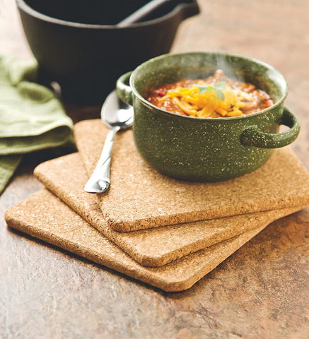Fox Run square cork trivet under plants protects tables from heat and moisture.