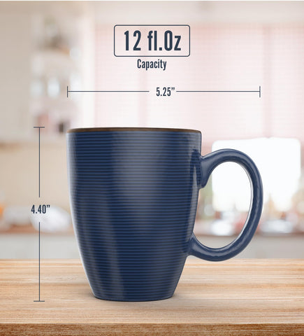 Francois et Mimi ribbed colorful ceramic mugs brighten tea breaks.