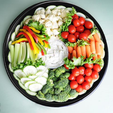 Frcctre trays hold sandwiches, vegetables, cheeses and baked goods attractively.