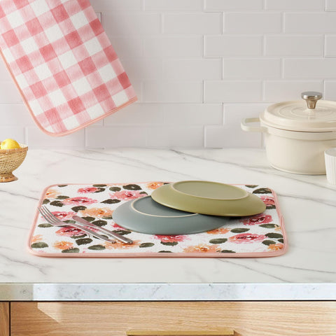 FreshMINT floral design dish drying mat absorbs moisture and adds vibrant style to countertops.