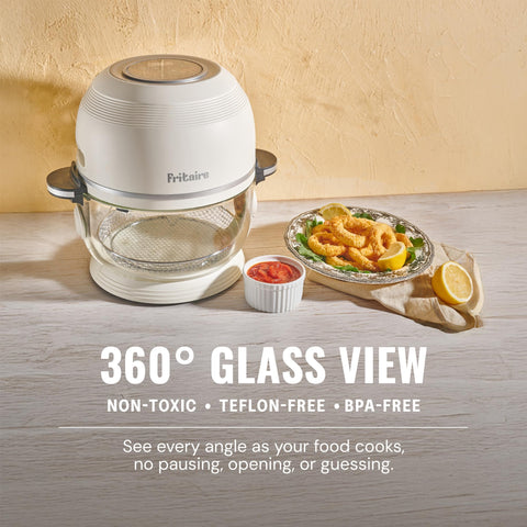 Fritaire rotisserie roast setup enables hands-free cooking of a whole chicken.