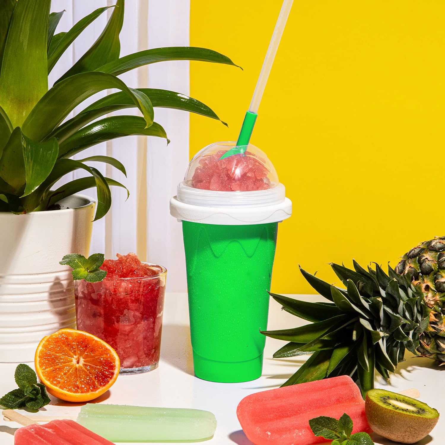 Vibrant green Frozen Magic Slushy Cup adds fun to kitchen moments.