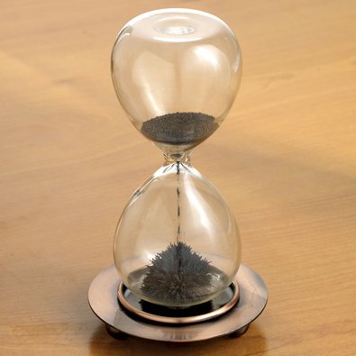 Westminster magnetic filings fall through hourglass for mesmerizing sculptures