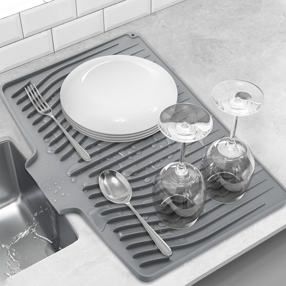FUYXINGXY silicone dish drying mat with drain keeps counters dry and organized.