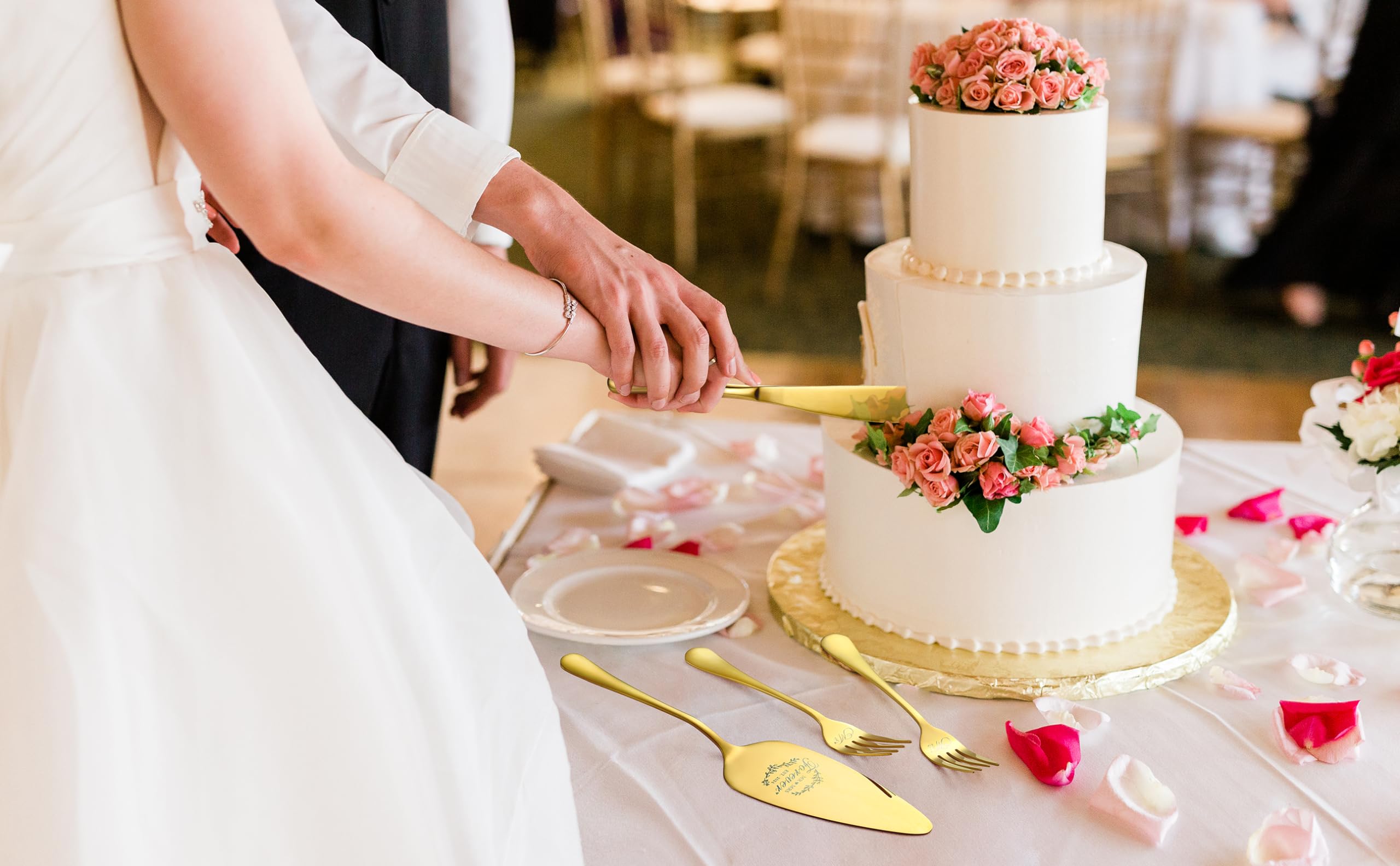 Galaxozent cake knife and server engraved MR and MRS showcased on dessert tray.