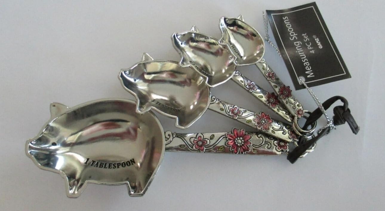 Ganz 1-tbsp spoon features pig motif and floral handle for ingredient pacing.