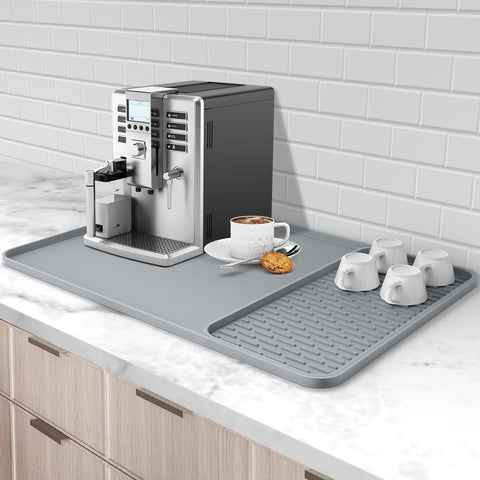 Garolue silicone coffee mat under coffee maker protects counters from heat and spills.