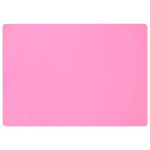 Gartful extra-large silicone mat placed under an appliance, protecting countertops during meal prep