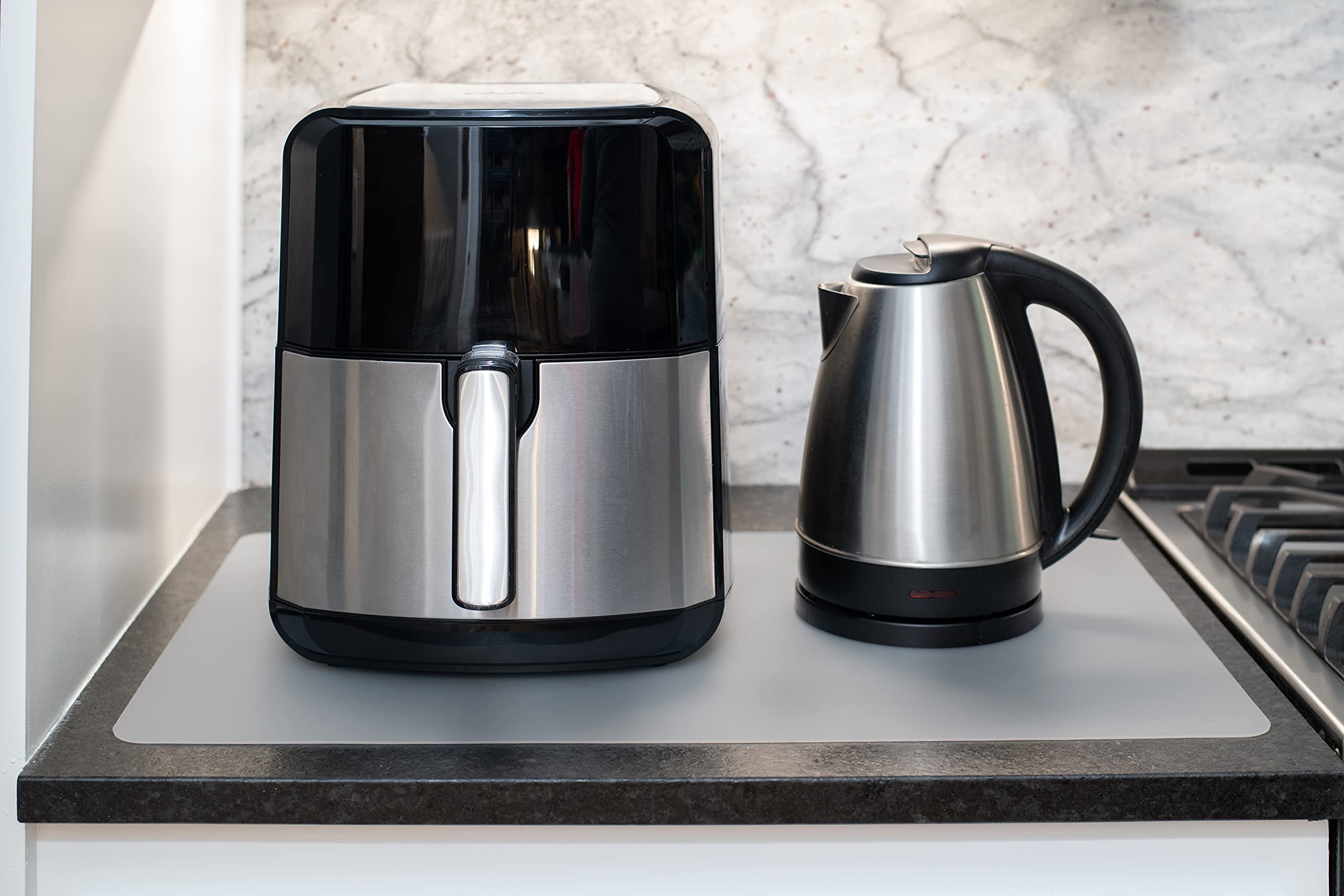 GASARÉ mats resist heat up to 446°F under appliances like air fryers