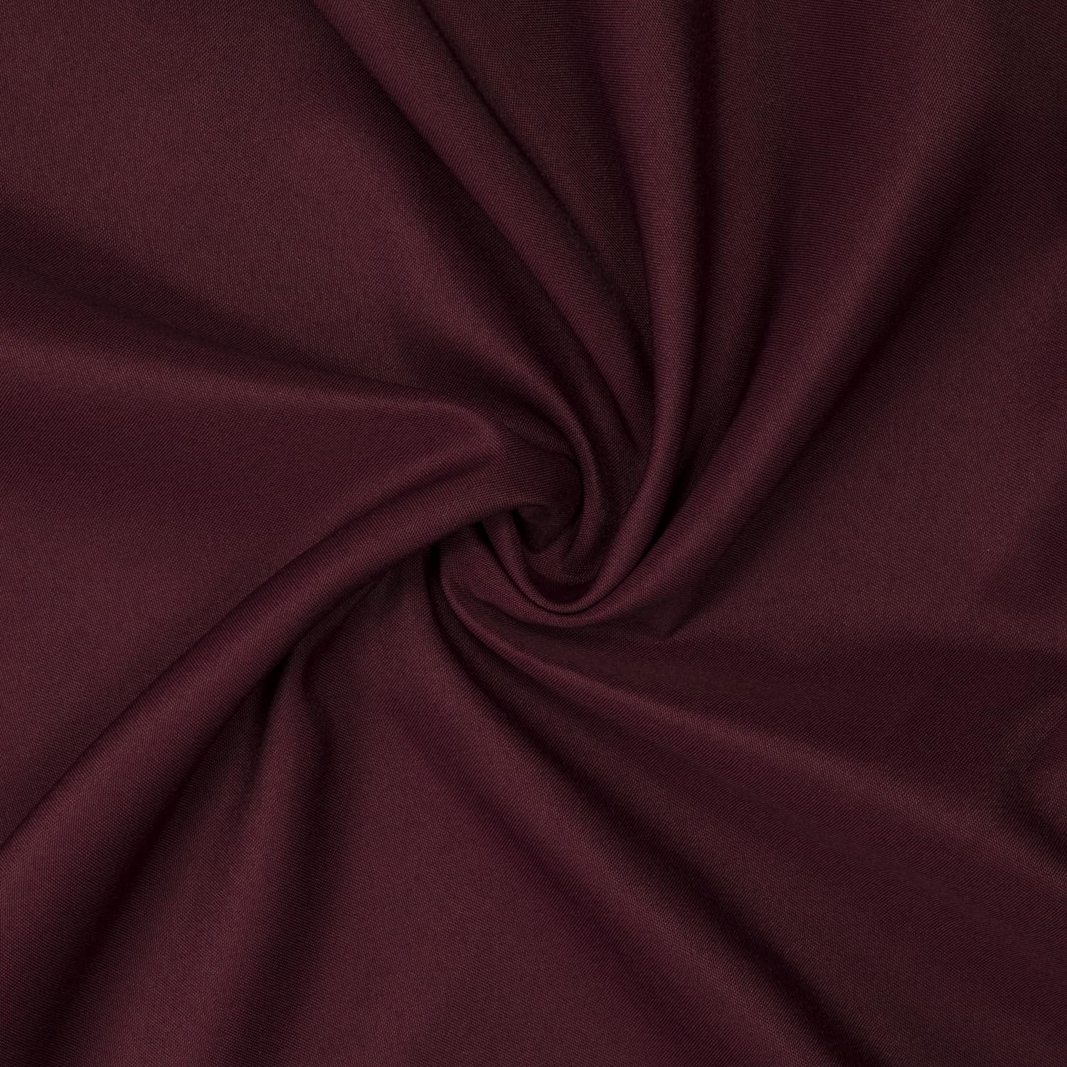 Gee Di Moda dining setup with burgundy cloth