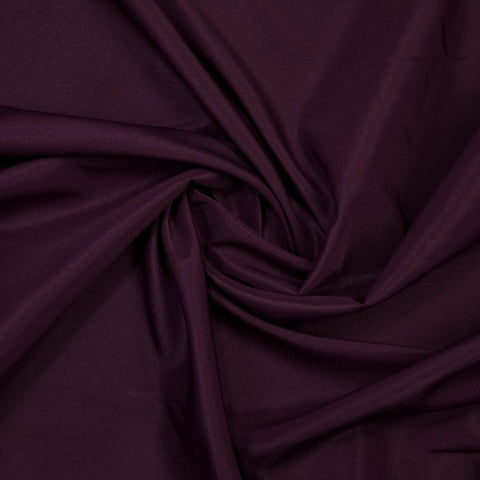 Gee Di Moda eggplant tablecloth frame with guests, durable for events.