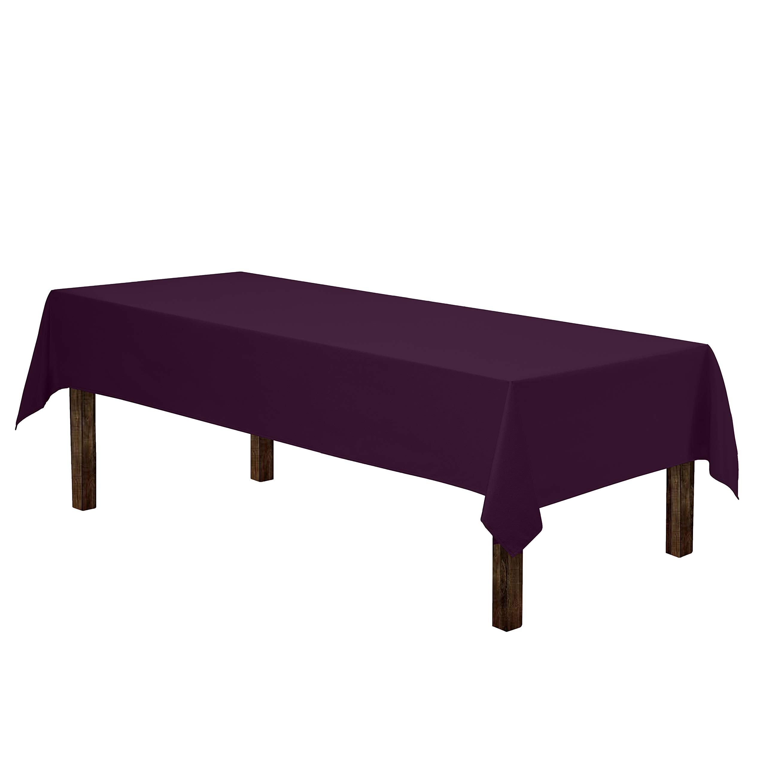 Gee Di Moda eggplant tablecloth on-table scene showcasing clean hemmed edges.
