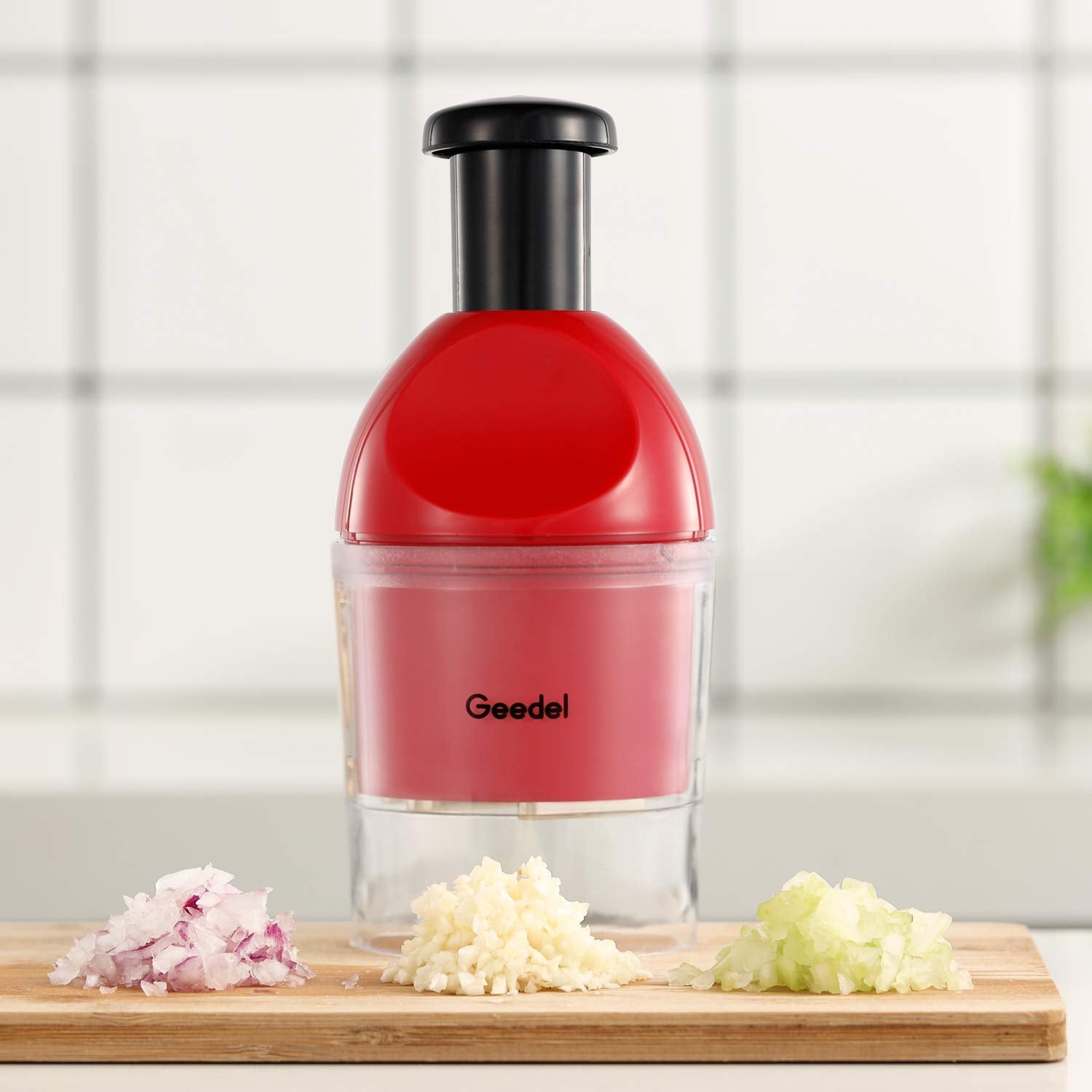 Geedel Food Chopper stored beside cutting board ready for quick meals