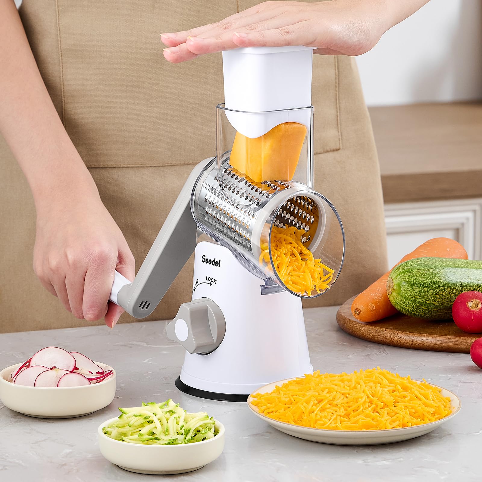 Geedel rotary grater handles vegetables and fruits for quick slices.