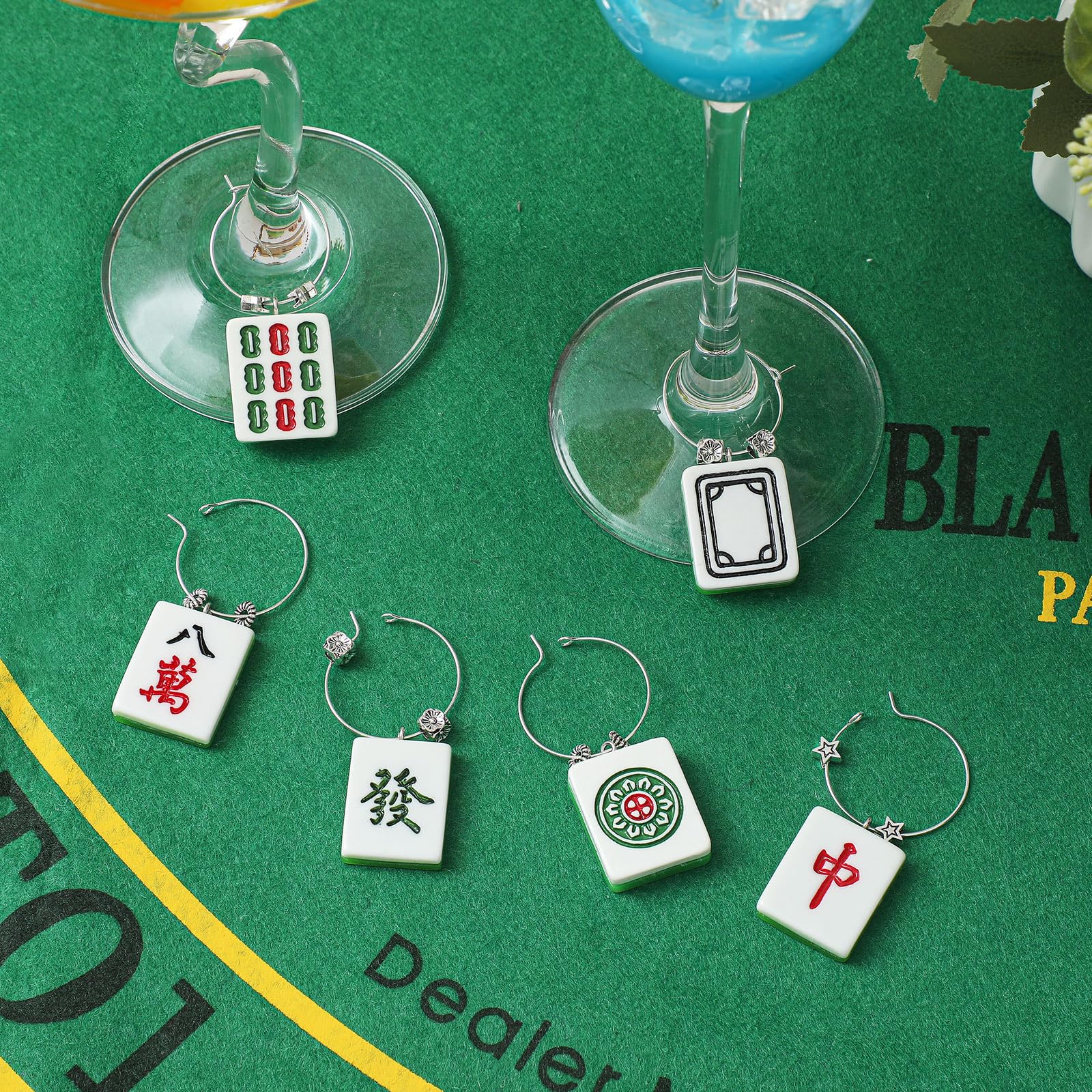 Geelin resin pendants with colorful accents personalize glasses at gatherings.