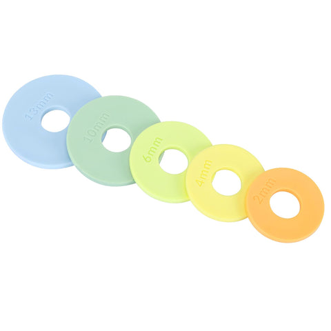 Geesta rolling pin rings multicolor spacer bands for precise dough thickness.