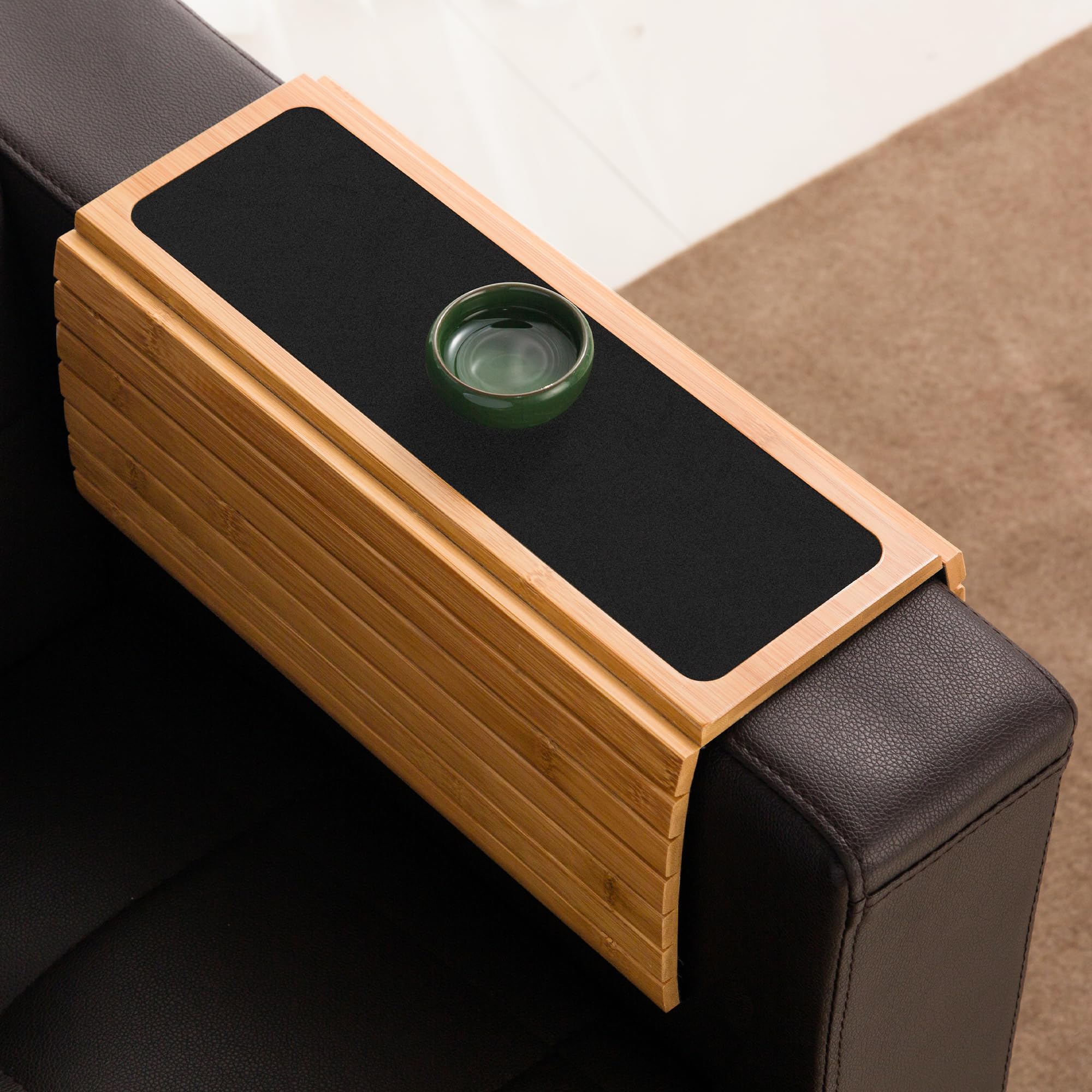 GEHE arm tray table used to organize remotes and snacks during movie night.
