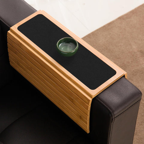 GEHE arm tray table used to organize remotes and snacks during movie night.