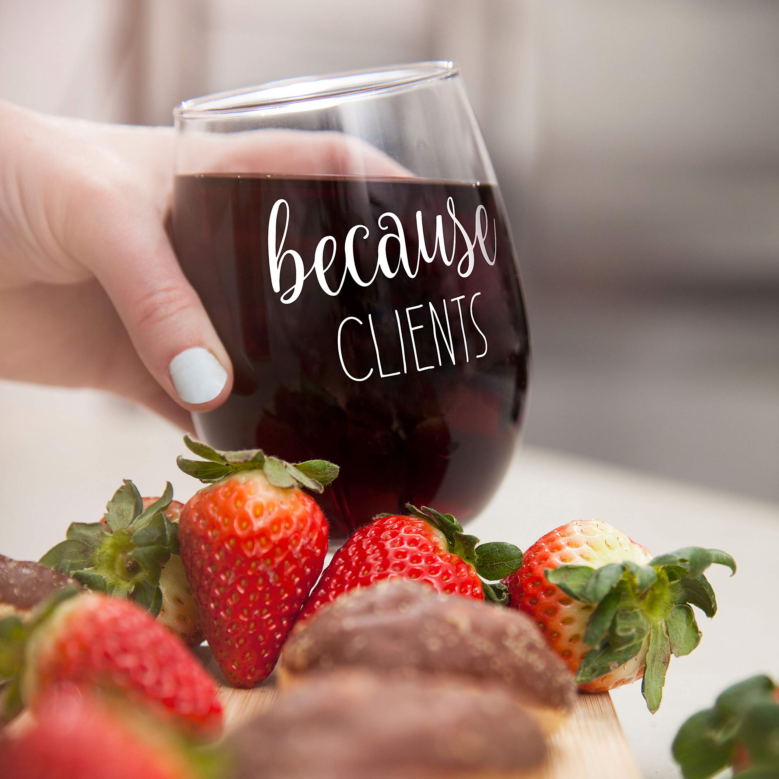 Close-up of Gelid Because Clients stemless wine glass showing printed design