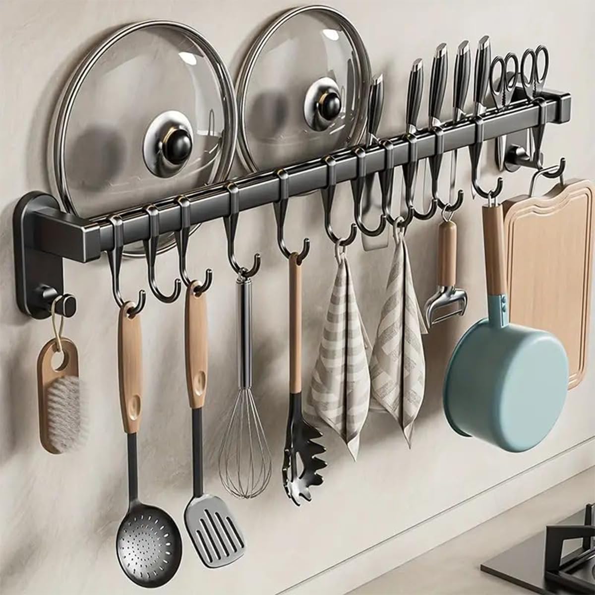 Generic AmoiChic wall-mounted rack holds pots securely, saving cabinet space.