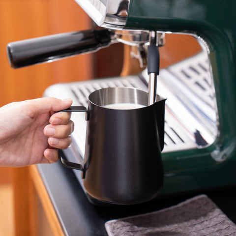 Generic stainless steel milk pitcher is dishwasher safe for quick cleanup.