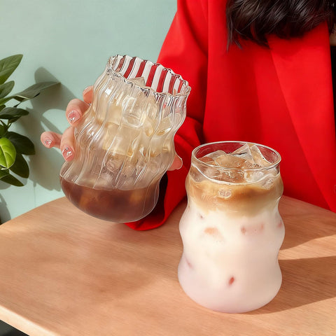 Generic transparent glass cup enhances beverage aesthetics and color changes.