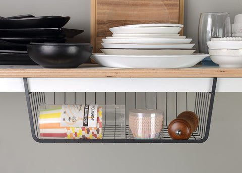 GENIYA pantry storage basket full of snacks, optimizing compact pantry.