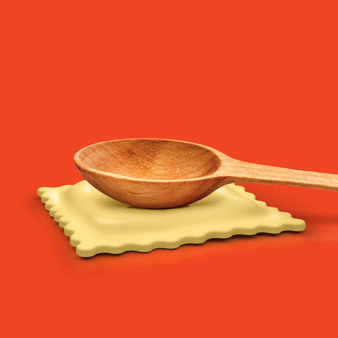 Genuine Fred SAUCED UP ravioli rest in use over stovetop collects sauce neatly.