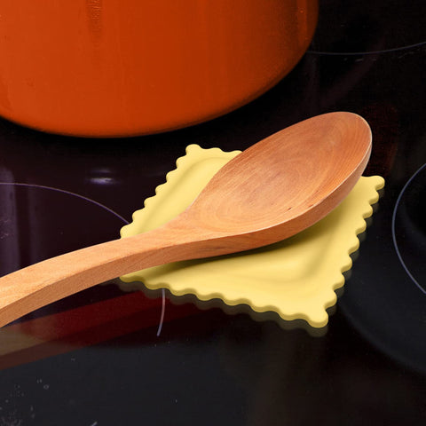 Genuine Fred SAUCED UP spoon rest side view keeps countertops clean while cooking.